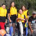 Guide  takes kids fishing