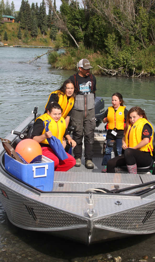 Guide  takes kids fishing