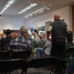 Photo by Megan Pacer/Peninsula Clarion Veterans listen to each other's testimony about the Choice Program during a Veterans Affairs listening session held Monday, Aug. 24 2015, at the Kenai Chamber of Commerce and Visitors Center in Kenai, Alaska.