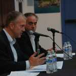 Photo by Megan Pacer/Peninsula Clarion Sen. Dan Sullivan (R-Alaska) (left) and Veterans Affairs Under Secretary for Health Dr. David Shulkin (right) address veterans gathered for a VA listening session targeting the Veterans Choice Act, held Monday, Aug. 24 2015, at the Kenai Chamber of Commerce and Visitors Center in Kenai, Alaska.