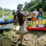 ADVANCE FOR WEEKEND EDITIONS, SEPT. 5-6 - In this photo taken Thursday, Aug. 27, 2015, Jeff Mitchell, a retired ecology teacher from Philomath High School, teaches about freshwater mussels during a morning stop along the Willamette River near Corvallis, Ore. (Andy Cripe/The Corvallis Gazette-Times via AP) MANDATORY CREDIT