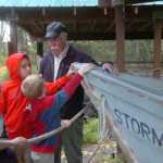 Photo by Megan Pacer/Peninsula Clarion Volunteer Paul Moses teaches children from a Soldotna Elementary third grade class about a boat named "Stormrunner" during their field trip on Thursday, Sept. 10, 2015 at the Soldotna Homestead Museum in Soldotna, Alaska.