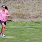Photo by Megan Pacer/Peninsula Clarion A runner nears the finish line of the Making Strides Against Breast Cancer Walk/Run on Sunday, Sept. 13, 2015 at the Tsalteshi Trails in Soldotna, Alaska.