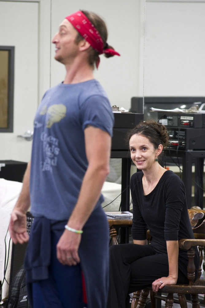 ADVANCE FOR SUNDAY SEPT. 13 - In this Aug. 27, 2015 photo, Julie Diana watches her husband, Zachary Hench teach a ballet class at Juneau Dance Theatre in Juneau, Alaska. About 15 years ago, the San Francisco Ballet was touring Spain when principal dancer Julie Diana's partner fell and broke his foot. A dancer who had recently joined the company, Zachary "Zak" Hench, stepped in and learned the part in just three days.  It was the start of long-lasting partnership that has, most recently, brought the two to Juneau. Diana is the new executive director of Juneau Dance Theatre, and Hench is the new artistic director. (Michael Penn/Juneau Empire via AP) MANDATORY CREDIT