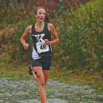 Photo by Rashah McChesney/Peninsula Clarion  Kenai Central's Riana Boonstra wins the girls varsity race with a time of 12:11.7 during the Kenai Peninsula Borough's cross country championships on Tuesday Sept. 15, 2015 in Soldotna, Alaska.