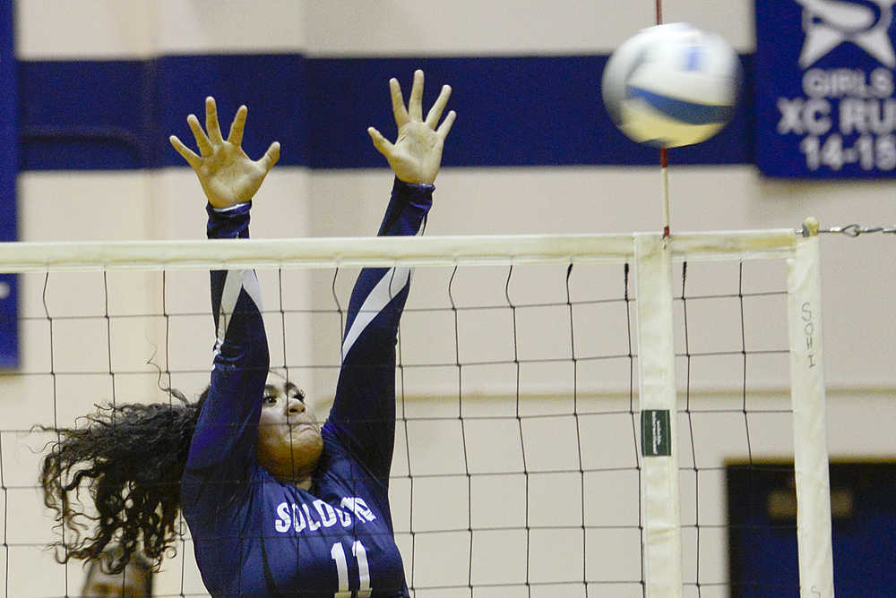 Photo by Rashah McChesney/Peninsula Clarion  Soldotna's Sylvia Tuisaula blocks a shot during a game against Colony on Thursday Sept. 17, 2015 in Soldotna, Alaska.
