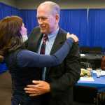 Photo by Rashah McChesney/Peninsula Clarion  Sara Pozonsky hugs Alaska Gov. Bill Walker during a chamber luncheon on Wednesday Sept. 23, 2015 in Soldotna, Alaska.