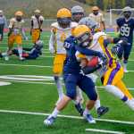 Photo by Rashah McChesney/Peninsula Clarion Soldotna's Brandon Crowder tackles Lathrop's Ricardo Henry during their game on Saturday Sept. 26, 2015 in Soldotna, Alaska.