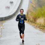 Photo by Rashah MCChesney/Peninsula Clarion Allan Spangler, of Anchorage, held a lengthy lead over the other 54 marathon runners in the Kenai River Marathon for the last half of the race on Sunday Sept. 27, 2015 in Kenai, Alaska. Spangler won the marathon with a time of 2:36:42.