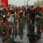 Photo by Megan Pacer/Peninsula Clarion Runners take off at the start of a half marathon on Sunday, Sept. 27, 2015 during the annual Kenai River Marathon at the Kenai Chamber of Commerce and Visitor Center in Kenai, Alaska.