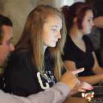 Photo by Kelly Sullivan/ Peninsula Clarion Kenai Watershed Forum GIS Specialist Branden Bornemann assists Nathan Erfruth's geography student India Bates during the two-day course in Geographical Information System taught by members of the Kenai Peninsula GIS User Group Friday, Sept. 25, 2015, at Soldotna Prep in Soldotna, Alaska.