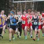 Photo by Joey Klecka/Peninsula Clarion Chugiak senior Ty Jordan (448) and Soldotna senior Aaron Swedberg (718) lead the charge at the start of Saturday's Class 4A boys state championship race at Bartlett High School in Anchorage. Jordan won the race while Swedberg placed eighth.