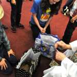 Father Tom Rush of the Our Lady of the Angels Catholic Church in Kenai blesses Starlight and Clover, two rabbits, Sunday at the St. Francis by the Sea Church in Kenai. The two churches held a joint Blessing of the Animals event to honor St. Francis, who Rush said honored all life, including animals.