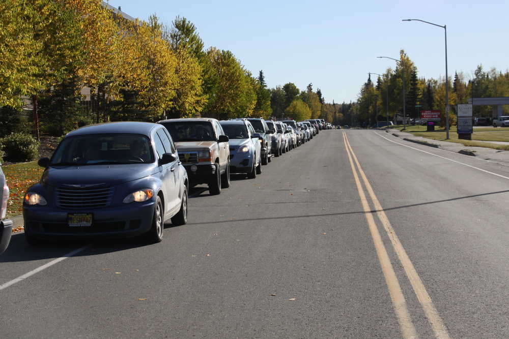 Hundreds line up for drive by free flu shots at Central Peninsula Hospital.