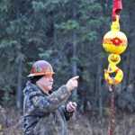 Bill Elmore, the owner of Alaska Crane Consultants, administers a practcal exam Friday morning.
