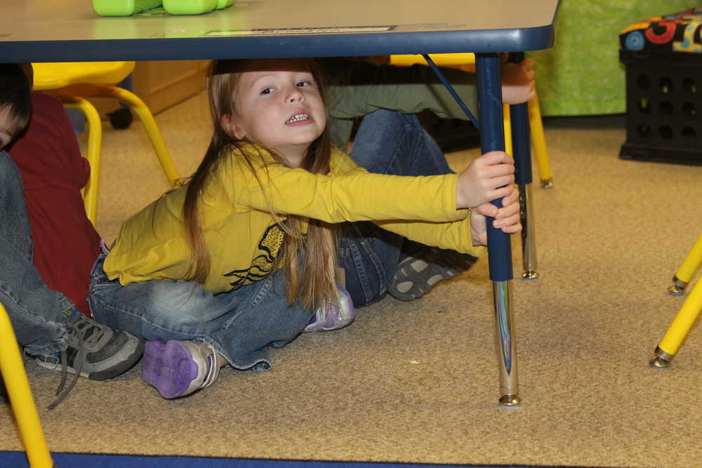 Receiving instructions on how long to wait after a real quake once it stops.