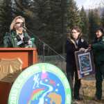 Photo by Megan Pacer/Peninsula Clarion Regional Forester Beth Pendleton, left, and Chugach Forest Supervisor Terri Marceron, right, present Kenaitze Indian Tribe Member Jon Ross with gifts after his blessing of the 2015 U.S. Capitol Christmas Tree on Tuesday, Oct. 27, 2015 at the Chugach National Forest near Seward, Alaska.