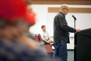 Photo by Rashah McChesney/Peninsula Clarion Nikiski resident Bill Warren gives comments to members of the Federal Energy Regulatory Committee during a meeting on the Alaska LNG project on Tuesday Oct. 27, 2015 in Nikiski, Alaska. Warren said his home on the bluff was sited less than 1,000 feet from one of the gates of the proposed LNG terminal, yet no one had contacted him about the project.