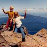 In this 1970 photo provided by Art Ekerson, Ekerson's children Cheryl Ekerson, right, and Kevin Ekerson flash peace signs on their first trip to the summit of Mount McLoughlin near Butte Falls, Ore.  Ekerson summited the mountain once more with his children on Sept. 15, 2015, to celebrate his 80th birthday. (Art Ekerson via AP)  MANDATORY CREDIT