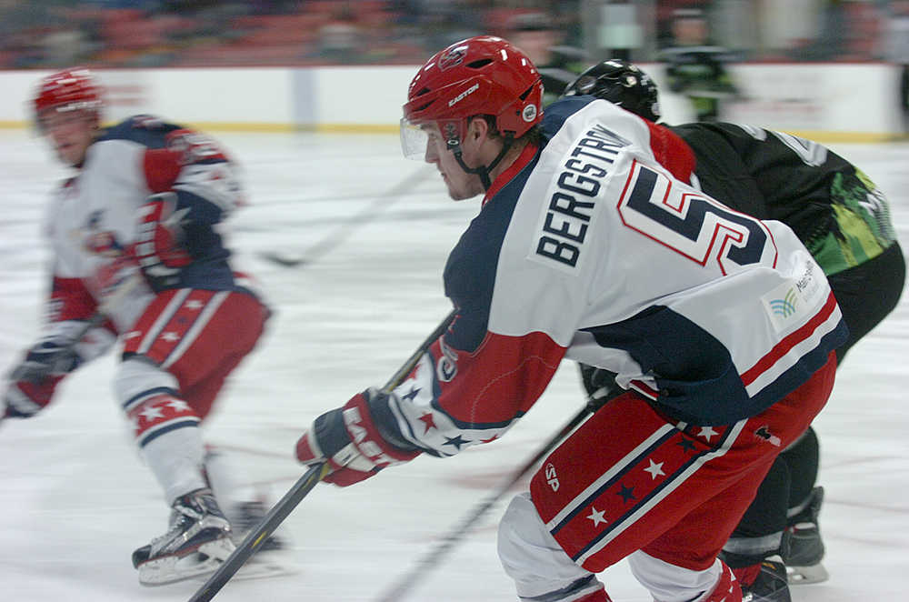 Photo by Rashah McChesney/Peninsula Clarion Aston Rebel Victor Bergstrom looks for an opening during a game against the Kenai River Brown Bears on Friday October 30, 2015 in Soldotna, Alaska.