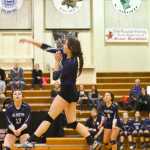 Ben Boettger/Peninsula Clarion Judah Aley slaps the ball across the net during a game against Wasilla on Thursday Nov. 5 at Kenai Central High School.