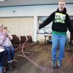 Ben Boettger/Peninsula Clarion Malakai Hansen, demonstrating sports skills he learned with his visual impairment, jumps rope during the Kenai Peninsula School District's Celebraille event on Friday, Nov. 6 at the Soldotna Public Library.