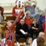 Ben Boettger/Peninsula Clarion Kenai volleyball player Alexis Baker hits the ball over the net during a game against Wasilla on Friday Nov. 6 at Kenai Central High School.