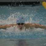 Photo by Joey Klecka/Peninsula Clarion Soldotna's Cody Watkins competes in the 100-yard butterfly Saturday at the state swimming and diving meet at Bartlett High School in Anchorage.