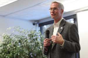 Photo by Kelly Sullivan/ Peninsula Clarion University of Alaska President Jim Johnsen speaks at the Kenai Peninsula College Kenai River Campus McLane Commons, only one top on his two-day tour to the Kenai Peninsula Tuesday, Nov. 10, 2015, in Soldotna, Alaska. It is the first time a UA system president has been to the Kenai Peninsula in nearly seven years, said KPC Director Gary Turner.