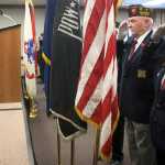 Photo by Rashah McChesney/Peninsula Clarion  Sophie Micciche sings the national anthem during a Veterans Day ceremony on Wednesday Nov. 11, 2015 in Soldotna, Alaska.