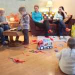 Photo by Kelly Sullivan/ Peninsula Clarion A group of Nikiski residents who are in the beginning stages of developing a parents cooperative community preschool gathered Thursday, Nov. 12, 2015, at Katy Bethune's home in Nikiski, Alaska.