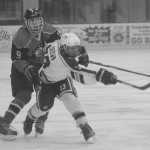 Photo by Joey Klecka/Peninsula Clarion Soldotna forward Ethan Brown slaps a shot on goal while evading Juneau defender Quin Gist Thursday at the Soldotna Regional Sports Complex.