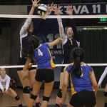 Photo by Joey Klecka/Peninsula Clarion Homer seniors McKi Needham and PK Woo (1) block a shot by Kotzebue sophomore Calia Sieh (4) Friday at the Class 3A state volleyball tournament at the Alaska Airlines Arena in Anchorage.
