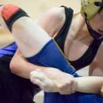 Photo by Rashah McChesney/Peninsula Clarion Soldotna's Gideon Hutchinson wrestles Homer's Seth Inama during the Peninsula Duals on Friday Nov. 13, 2015 in Nikiski, Alaska.