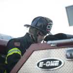 Photo by Megan Pacer/Peninsula Clarion Central Emergency Services Firefighter Matt Seizys works on one of the organization's engines during a practice drill on Tuesday, Nov. 17, 2015 at the CES station on Kalifornsky Beach Road. He and other firefighters have been training for about two months for an engineering test coming up on Nov. 19.
