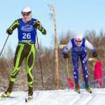 Colony's Tracen Knopp skis just ahead of Soldotna's Levi Michael during the 10-kilometer classic race of the ASAA/First National Bank State Cross-Country Ski Championships at Kincaid Park in Anchorage Friday.