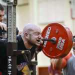 Photo by Rashah McChesney/Peninsula Clarion Donald Staton, of soldotna, successfully squats 469 pounds during the Dena'ina Powerlifting Meet on Saturday Nov. 21, 2015 at Kenai Central High School in Kenai, Alaska.