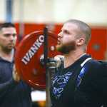 Photo by Rashah McChesney/Peninsula Clarion James Kinslow, of Kenai, tries to squat 358 pounds during the Dena'ina Powerlifting Meet on Saturday Nov. 21, 2015 in Kenai, Alaska.