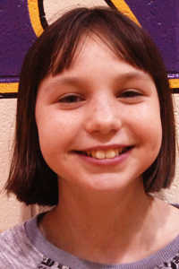 Kenai Middle School student Taylor Andrew is thankful for her family and her two dogs. "Their names are Allie and Thor and they're English Mastiffs. They drool a lot, but they're really fun to play with," Andrew said. (Photo by Ben Boettger, Peninsula Clarion)