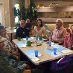 This Sept. 2, 2015 photo released by the U.S. Department of Agriculture shows diners at a long-term senior care facility in Kotzebue, Alaska. Now that the long-term senior care facility in Kotzebue just began incorporating traditional foods into the regular menu, its Alaska Native residents no longer have to just wait for monthly family potlucks to enjoy the taste of the subsistence foods they grew up with. (Sedelta Oosahwee/U.S. Department of Agriculture via AP)