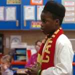 Photo by Megan Pacer/Peninsula Clarion Exchange student Nouredine Mama, of Cameroon, shares details about his culture and life in Africa with fourth and sixth grade students on Wednesday, Nov. 25, 2015 at Nikolaevsk School in Nikolaevsk, Alaska. Mama is attending Homer High School while in the state through an exchange program.