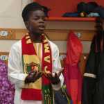 Photo by Megan Pacer/Peninsula Clarion Exchange student Nouredine Mama, of Cameroon, shares details about his culture and life in Africa with fourth and sixth grade students on Wednesday, Nov. 25, 2015 at Nikolaevsk School in Nikolaevsk, Alaska. Mama is attending Homer High School while in the state through an exchange program.