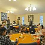 Photo by Elizabeth Earl/The Peninsula Clarion The Kasilof Community Church opened its doors to the public for a free Thanksgiving dinner Thursday. The next-door cafe, Rocky's Cafe, prepared the food, and volunteers served it in the church.
