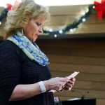 Photo by Megan Pacer/Peninsula Clarion Soldotna resident Gail Kennedy helps present the second annual Candlelight Remembrance Program on Sunday, Dec. 13, 2015 at the Christ Lutheran Church in Soldotna, Alaska. The local chapter of The Compassionate Friends hosts the event for parents whose children have died.