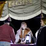 Ben Boettger/Peninsula Clarion  Census-taker Gary Couveau registers new arrivals in Bethlehem on Friday, Dec. 18 at the College Heights Baptist Church in Soldotna.