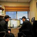 Photo by Elizabeth Earl/Peninsula Clarion Jay Kane (left) and Kole McCaughey (right) manned  Nikiski Fire Station 1 on Christmas Day. Usually, Christmas Day is pretty slow, and the two had plans to make a ham to celebrate.