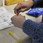 Photo by Elizabeth Earl/Peninsula Clarion Dr. Sarah Spencer of the Ninilchik Community Clinic demonstrates using a naloxone pen, an overdose rescue medication. She instructs her patients and their families on how to use it in case of an emergency.