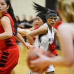 Photo by Kelly Sullivan/ Peninsula Clarion Nikiski Bulldog Arianne Parrish makes sure she is accessible to her team mate during the game against the Houton High School Hawks, Saturday, Jan. 17, 2015, at Nikiski Middle-High School in Nikiski, Alaska.
