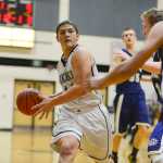 Photo by Rashah McChesney/Peninsula Clarion Nikiski's Luke Johnson catches a pass during their game Homer on Saturday Jan. 10,  2015 at Nikiski Middle-High School in Nikiski, Alaska.