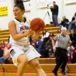 Ben Boettger/Peninsula Clarion Kenai basketball player Sarah Every scans the court for an open team mate during a game again South Anchorage High School on Friday, Dec. 18 at Kenai Central High School.